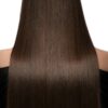 Beautiful brown-haired girl with a perfectly smooth hair. Beauty hair.